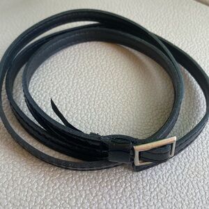Skinny Belt, Black Patent Leather (synthetic) and silver tone metal buckle. NWOT